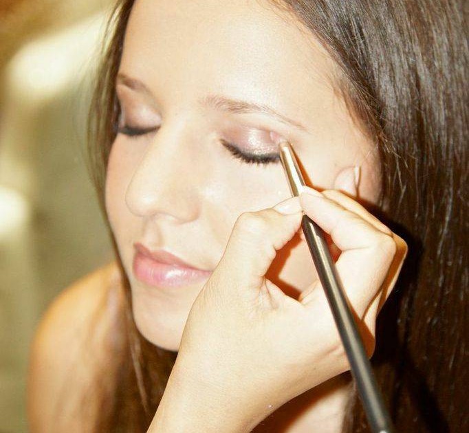 A guest having makeup done at the launch event. 